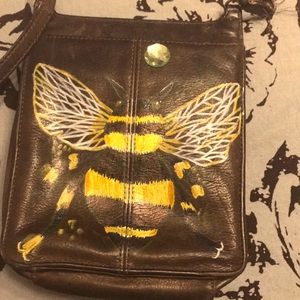 Hand-painted vintage reclaimed fossil of the shoulder handbag